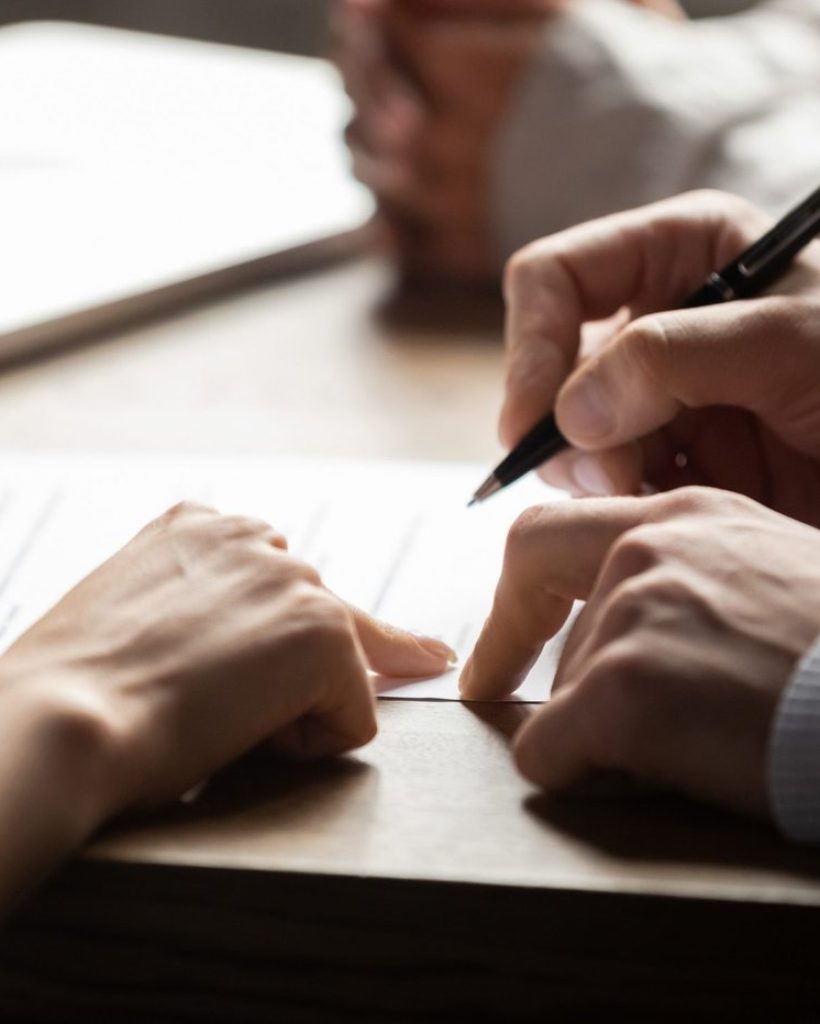 Solicitor,Pointing,At,Insurance,Contract,Showing,Male,Client,Where,To